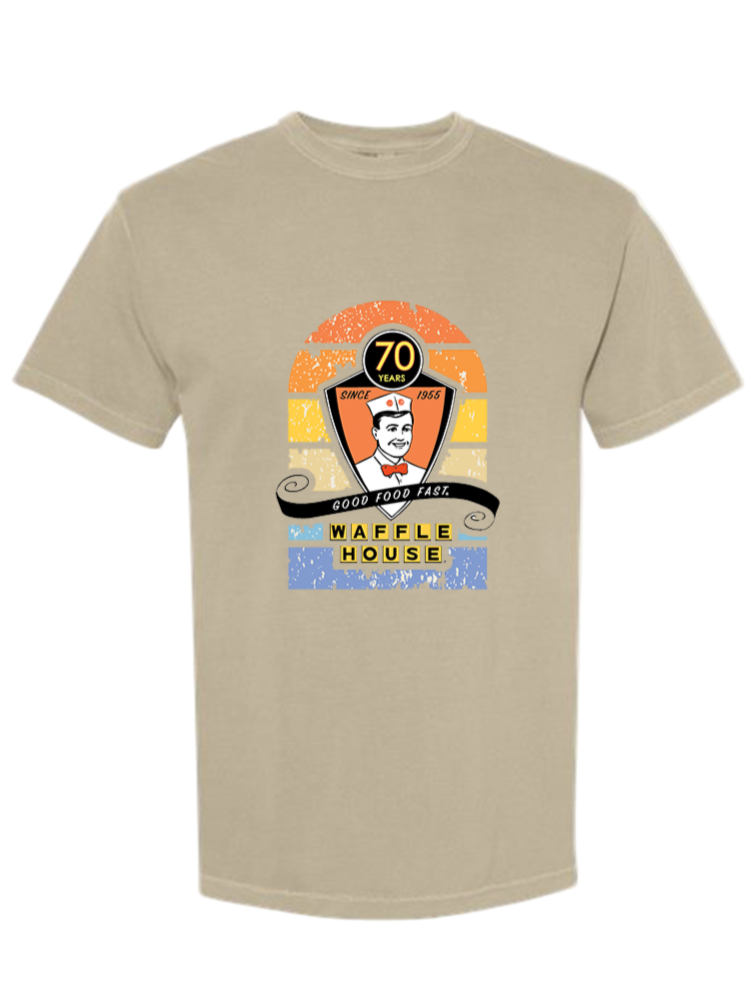 Khaki colored t-shirt with a 70th graphic design on the chest area