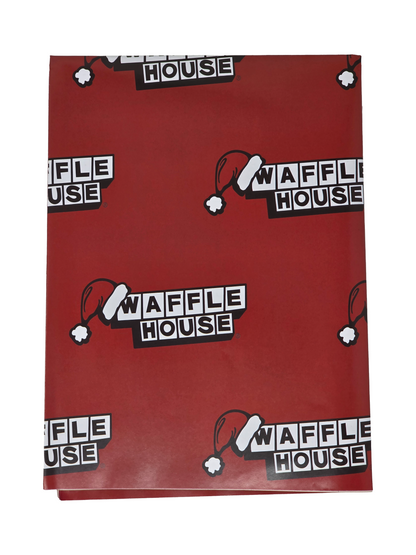 Red wrapping paper patterned with repeating Waffle House logos, each one wearing a little Santa hat.