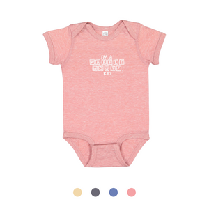 Pink childs onesie with I'm a Waffle House Kid printed in white