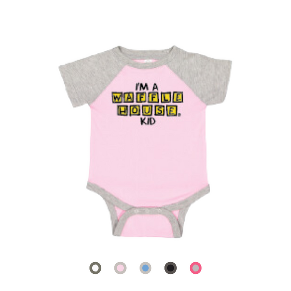 Pink onesie with grey sleeves and trim with “I’m a Waffle House Kid” printed.