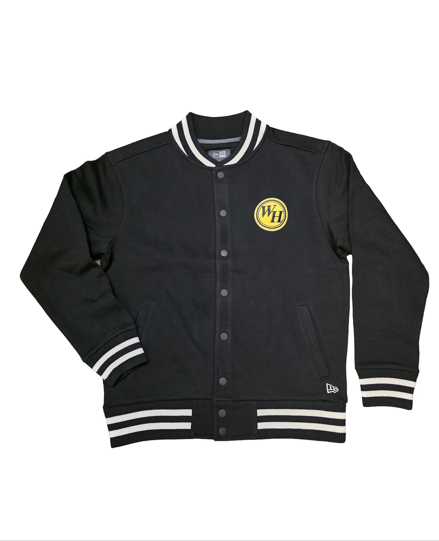 It’s a black varsity-style jacket with striped cuffs and collar, featuring a small yellow “WH” patch on the left chest.