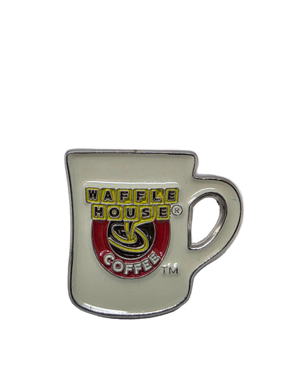 Waffle House Coffee mug-shaped metal badge on a white background