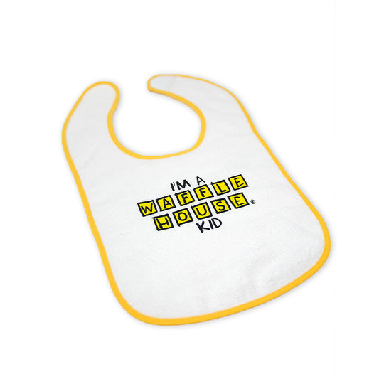 White baby bib with yellow trim with I'm a Waffle House kid on the front