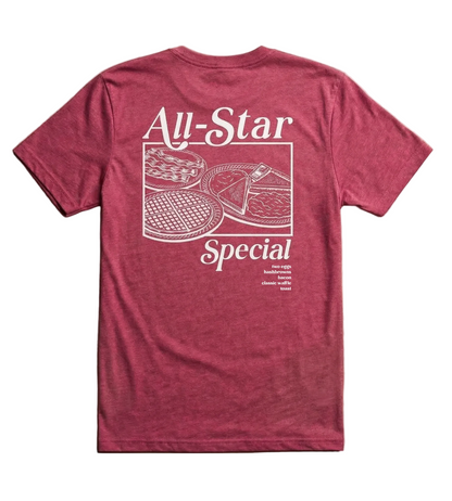 A red T-shirt with a large white graphic on the back reading “All-Star Special” above an illustration of a waffle, eggs, bacon, hashbrowns, and toast.