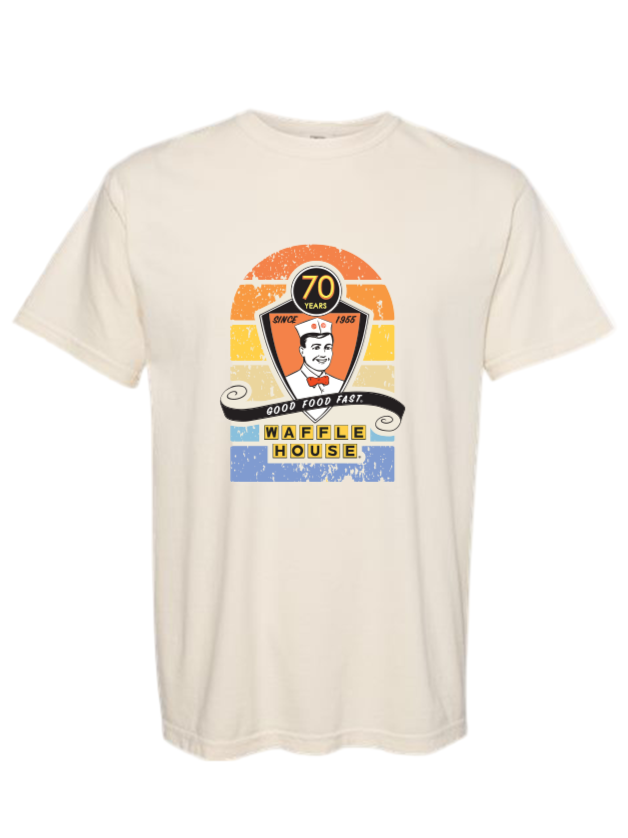 Ivory colored t-shirt with a 70th graphic design on the chest area